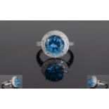 14ct White Gold Blue Topaz & Diamond Ring, Set With A Central Round Topaz (Estimated Weight 5,