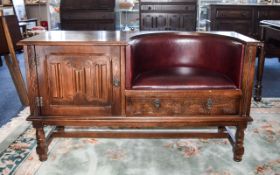 Dark Oak Telephone Seat Rectangular console with inset seat upholstered in oxblood leather,