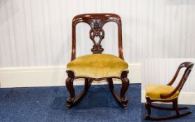 Victorian Period Walnut Nursing Rocking Chair with Ornate Carved Back Splat and Padded Seat,