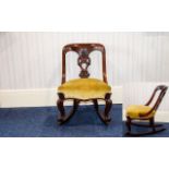 Victorian Period Walnut Nursing Rocking Chair with Ornate Carved Back Splat and Padded Seat,