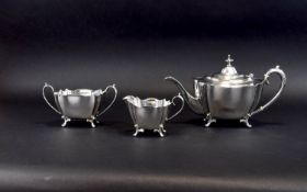 Plated Tea Service Late 19th century EPNS footed teapot, milk jug and sugar bowl. Elegant fluted