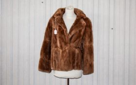 Musquash Coat Vintage hooded fur coat in light golden chestnut chevron pattern musquash.