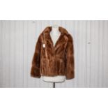 Musquash Coat Vintage hooded fur coat in light golden chestnut chevron pattern musquash.