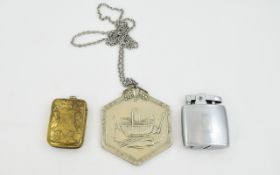 An Edwardian Brass Vesta Case Along With An Unusual Gardening Interest Medal Small brass vesta