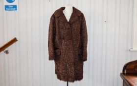 Astrakhan Vintage Coat Three quarter brown Persian lamb coat, front patch pockets,