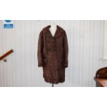 Astrakhan Vintage Coat Three quarter brown Persian lamb coat, front patch pockets,