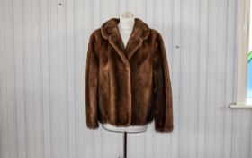 Mink Jacket Ladies vintage mink short jacket in golden brown fur with revere collar and side seam