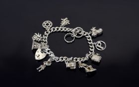 Vintage Silver Charm Bracelet, Loaded with 12 Charms. All Fully Hallmarked for Silver. 30 grams. All