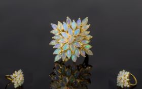 Ethiopian Opal Cluster Ring, a cluster of marquise cut opals set in a squared starburst formation,