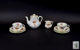 Royal Doulton Tea For Two Set Eight pieces in total, pattern number H1422 comprising teapot, two