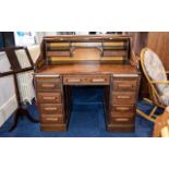 Antique Roll Top Writing Desk Circa 1920's Fashioned in dark oak with lovely aged patina.