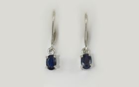Deep Blue Sapphire Drop Earrings, 1ct of sapphire set as solitaires in rhodium vermeil and silver