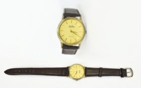A Gents Reflex Wrist Watch In Case With Brown Leather Strap