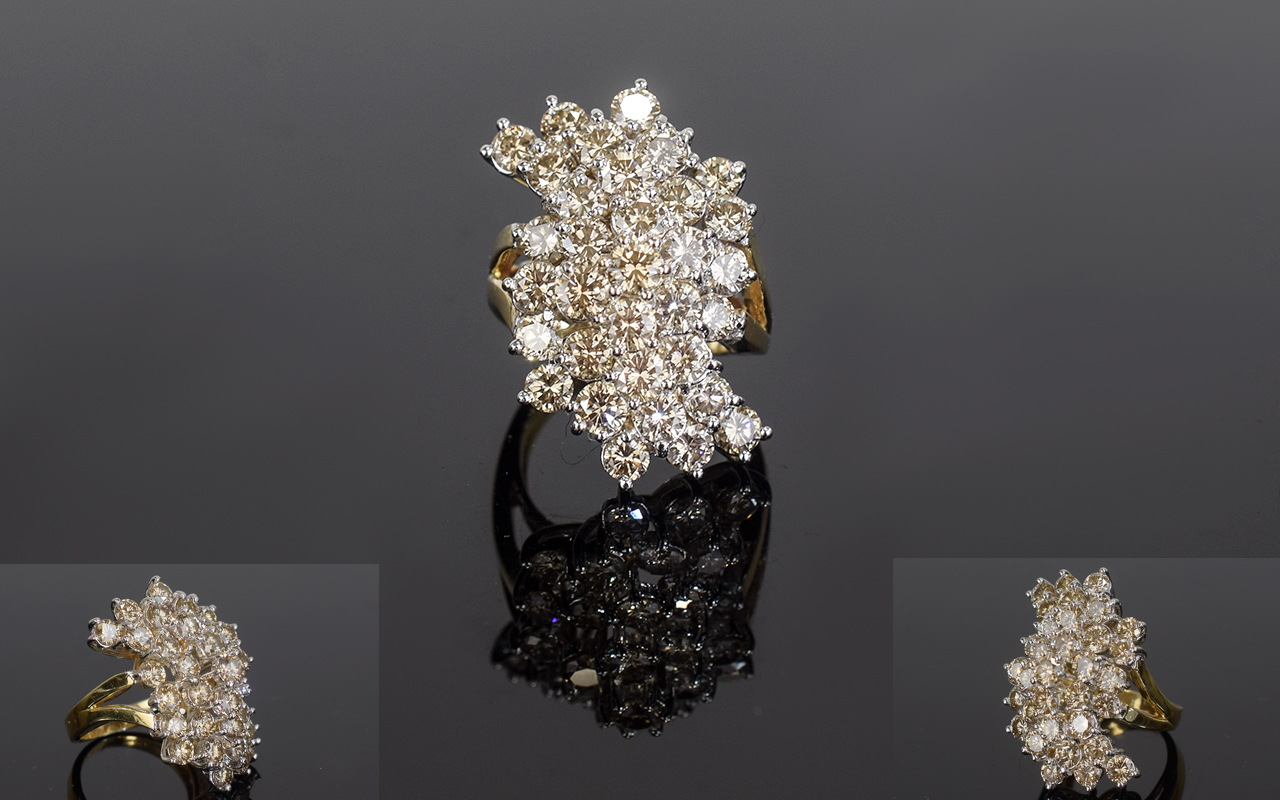 A Large and Impressive 14ct Gold Diamond Cluster Ring,