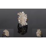 A Large and Impressive 14ct Gold Diamond Cluster Ring,
