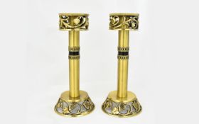 Arts and Crafts Style Pair of Brass Candlesticks with Stylish Floral and Fruit Decoration to Tops