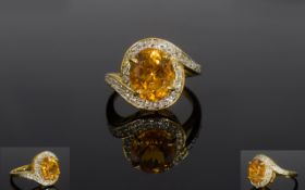 Citrine and White Topaz Ring, an oval cu