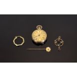 A Small Collection Of 9ct Gold Items Four items in total to include, ladies 9ct gold cased fob watch