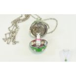 Green Enamelled Egg and Rabbit Charm Pendant, the egg pendant, enamelled in apple green and set with