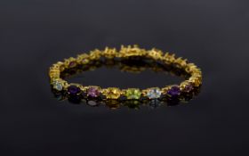 Multi Gem Tennis Bracelet, sky blue topaz, peridot, amethyst, rhodolite garnet and citrine totalling