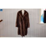 Vintage Mid Length Musquash Coat Ladies shawl collar coat in pale brown mink with side seam pockets,