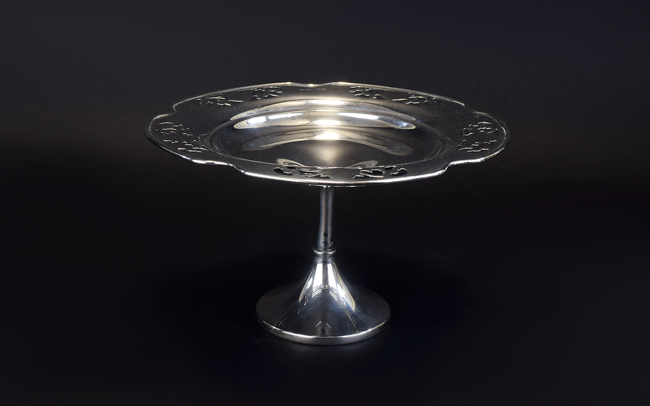 A Stylish and Nice Quality Silver Pedestal Shaped Bowl with open work borders and raised on