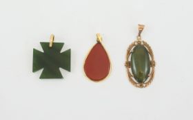 A Collection of 9ct Gold Mounted Stone Set Pendants ( 3 ) In Total. Includes 1/ A Polished Jade