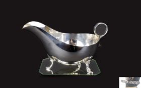 George VI - Quality Solid Silver Sauce Boat with Loop Handle and Raised on Splayed Feet. Hallmark