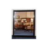 Large Bevelled Glass Mirror Early 20th century mirror in ebonised wood frame of plain form. Approx