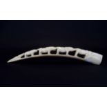 Antique Carved Ivory Elephant Tusk Figure circa 1900. Depicting a row of 5 elephants in graduated