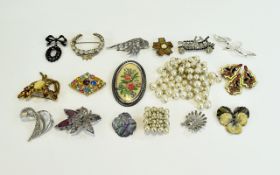 A Varied Collection Of Vintage Brooches Seventeen items in total to include crescent shaped