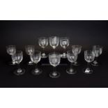 A Set Of Sherry Glasses Twelve in total with etched Greek key borders. Good condition. six