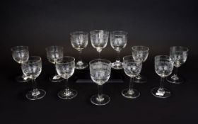 A Set Of Sherry Glasses Twelve in total with etched Greek key borders. Good condition. six