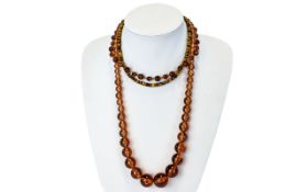 A Collection Of Vintage Glass And Stone Beaded Necklaces Three in total to include long pale
