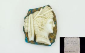 Early Roman White Paste Glass Cameo of the Roman Goddess of Agriculture, Ceres, with ribboned hair