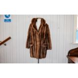 Vintage Mink Coat Mid length plush golden brown mink coat with front patch pockets, hook and eye