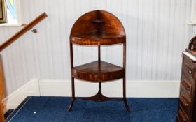 George III Mahogany Corner Washstand. Shaped gallery top over two tiers raised on splayed legs.