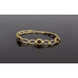 Ladies Vintage 9ct Gold Fancy Bracelet set with garnets. Fully hallmarked for 375 9 carat 4.9 grams.