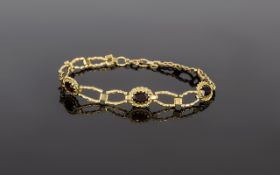 Ladies Vintage 9ct Gold Fancy Bracelet set with garnets. Fully hallmarked for 375 9 carat 4.9 grams.
