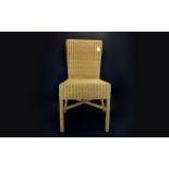 A Single Stand Chair In Natural Cane, Ideal for Conservatory.