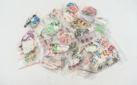 Large polythene bag full of sorted Machin GB stamps with various values. Ideal for variety hunters.