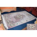 Oriental Wool Rug Pale powder pink rug with cream, dark pink, and green floral and foliate border.