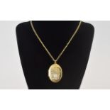 Vintage 9ct Gold Oval Shaped Locket with attached 9ct gold belcher chain both fully hallmarked for