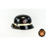Nazi World War I Pepperpot Helmet with liner and chin strap. Poss M35 Helmet.