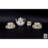Royal Doulton Tea For Two Set Eight pieces in total, pattern number H1422 comprising teapot, two
