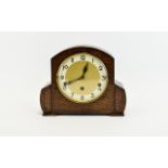 Art Deco Mantel Clock, Vintage wood cased clock in typical 1930's style. Features brushed gold