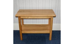 Modern Light Oak Sidetable. 35 by 20 inches deep.