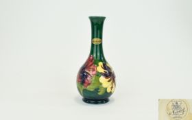 Moorcroft ( W ) Tube lined Large Specimen Vase ' Hibiscus ' Design on Green Ground. With Original