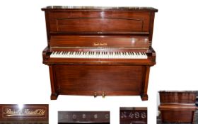 Russel and Russel Ltd Mahogany Upright Piano , Mahogany framed and ebony and ivory keys. 57 inches