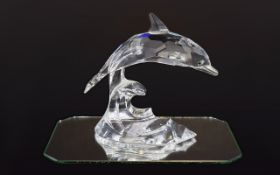 Swarovski Silver Crystal Figure South Seas Collection 'Dolphin on a Wave'. Design Michael Stamey